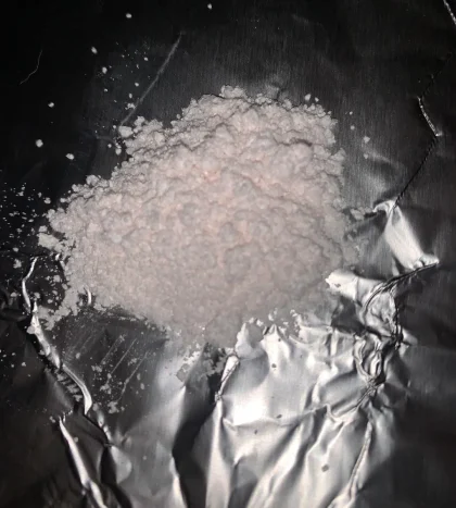 High purity 2C-B powder crystalline structure displaying a fine reflective texture optimized for volumetric liquidation protocols.